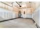 Unfinished garage with water heater and extra storage space at 14862 Tamarack Dr, Charlotte, NC 28278