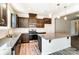 Modern kitchen with granite countertops and dark cabinetry at 14862 Tamarack Dr, Charlotte, NC 28278