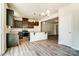 Open concept kitchen with granite countertops and island at 14862 Tamarack Dr, Charlotte, NC 28278