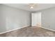 Spacious bedroom featuring wood-look floors and a ceiling fan at 2306 Morningside Dr, Lancaster, SC 29720