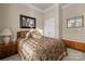 Charming bedroom with hardwood floors, a double door closet, and natural light at 3006 Cricket Ln, Lancaster, SC 29720