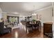 Open dining room with hardwood floors and adjacent kitchen at 3006 Cricket Ln, Lancaster, SC 29720