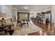 Bright living room with hardwood floors and neutral color palette at 3006 Cricket Ln, Lancaster, SC 29720