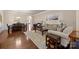 Spacious living room featuring hardwood floors, a neutral color palette, and ample natural light at 3006 Cricket Ln, Lancaster, SC 29720