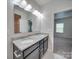 Bathroom with double vanity and granite countertop at 5065 Thomasville Dr, Belmont, NC 28012