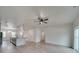 Open concept living room with hardwood floors and ceiling fan at 5065 Thomasville Dr, Belmont, NC 28012