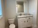 Bathroom with vanity, toilet, and shower bathtub combo at 51 Rosemont Dr, Stony Point, NC 28678