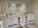 Double vanity bathroom with marble countertop and large mirror at 51 Rosemont Dr, Stony Point, NC 28678