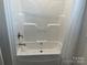 Clean bathroom with bathtub and shower at 51 Rosemont Dr, Stony Point, NC 28678