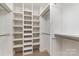 Large walk-in closet with shelving and hanging rods at 5140 Dunes Ct, Charlotte, NC 28226