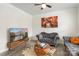 Living room with gray sofas, coffee table, and large window at 6416 Willow Pin Ln, Huntersville, NC 28078