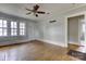 Living room with hardwood floors and ceiling fan at 818 Radio Rd, Statesville, NC 28677