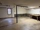 Unfinished garage with workbench and overhead lighting at 1134 Jennifer Ln, Cherryville, NC 28021