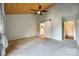 Main bedroom with vaulted ceiling, sliding barn door, and carpet flooring at 1170 Molokai Dr, Tega Cay, SC 29708