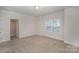 Spacious bedroom with neutral decor and a large closet at 159 Rubys Way # 35, Oakboro, NC 28129