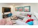Bonus room with sectional sofa and game table at 4362 Bronze Blvd, Sherrills Ford, NC 28673