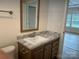 Bathroom with single vanity and mirror at 568 Drumstand Rd, Stony Point, NC 28678