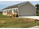 House exterior with front porch and deck at 568 Drumstand Rd, Stony Point, NC 28678