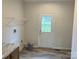 Laundry room with exterior access at 568 Drumstand Rd, Stony Point, NC 28678