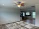 Open concept living room with a view into the kitchen at 568 Drumstand Rd, Stony Point, NC 28678