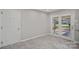 Laundry room with backyard access and built-in shelving at 600 Thomas Trl, Gastonia, NC 28054