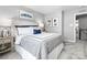 Spacious bedroom with a comfortable bed and a view of the upper hallway at 7315 Childress Sw Dr, Concord, NC 28025