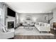 Spacious living room with fireplace and neutral color palette at 7315 Childress Sw Dr, Concord, NC 28025