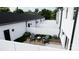 Private backyard with gravel patio and small seating area at 7329 Braswell Sw Dr, Concord, NC 28025