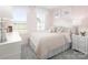 Charming bedroom with white furniture and pink walls at 7329 Braswell Sw Dr, Concord, NC 28025
