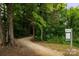 Walking trail through the woods at 7329 Braswell Sw Dr, Concord, NC 28025