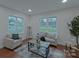 Bright and airy living room with hardwood floors and neutral decor at 848 Churchill Dr, Shelby, NC 28150