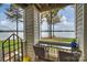 Lakefront balcony with seating area at 907 Southwest Dr, Davidson, NC 28036