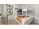 Bright bedroom featuring a bunk bed, and colorful wall art at 907 Southwest Dr, Davidson, NC 28036