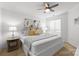 Spacious bedroom with king-size bed and ceiling fan at 907 Southwest Dr, Davidson, NC 28036