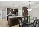 Kitchen with dark wood cabinets and island at 907 Southwest Dr, Davidson, NC 28036