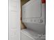 Stackable washer and dryer in a dedicated laundry closet at 907 Southwest Dr, Davidson, NC 28036