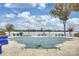 Community pool with lake view, currently covered for winter at 907 Southwest Dr, Davidson, NC 28036