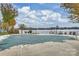 Community pool with a lake view, covered for the season at 907 Southwest Dr, Davidson, NC 28036