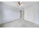 Light and airy bedroom with ceiling fan and double door closet at 113 Link Rd, Belmont, NC 28012