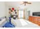 King bedroom featuring a large TV and plenty of closet space at 140 Rock Ridge Ln, Mount Holly, NC 28120