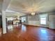 Open concept dining area with hardwood floors and kitchen views at 142 Swink Sw St, Concord, NC 28027