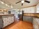 Kitchen features stainless steel appliances and wood flooring at 142 Swink Sw St, Concord, NC 28027