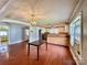 Galley kitchen with wood cabinets and a breakfast bar at 142 Swink Sw St, Concord, NC 28027