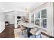 Bright dining room with a marble table and modern chandelier at 16930 Turtle Point Rd, Charlotte, NC 28278