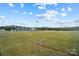 Well-maintained soccer field with goal posts and spectator area at 16930 Turtle Point Rd, Charlotte, NC 28278