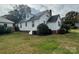 Side view of a white house with green landscaping at 1716 3Rd Ne St, Hickory, NC 28601