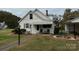 House exterior showcasing front porch and landscaping at 1716 3Rd Ne St, Hickory, NC 28601
