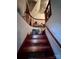 Wooden staircase leading to the upper level at 1716 3Rd Ne St, Hickory, NC 28601