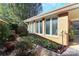 Brick house with sunroom and landscaping at 1811 Charter Dr, Rock Hill, SC 29732