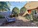 Private backyard with lounge chairs and landscaping at 1811 Charter Dr, Rock Hill, SC 29732